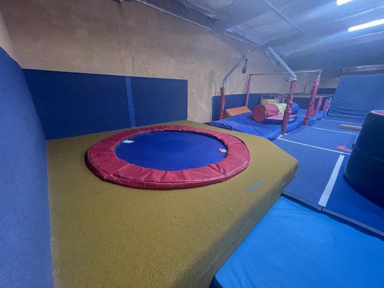 Gymnastics Facility with gymnastics equipment Colorful Mats Mini Gym Area