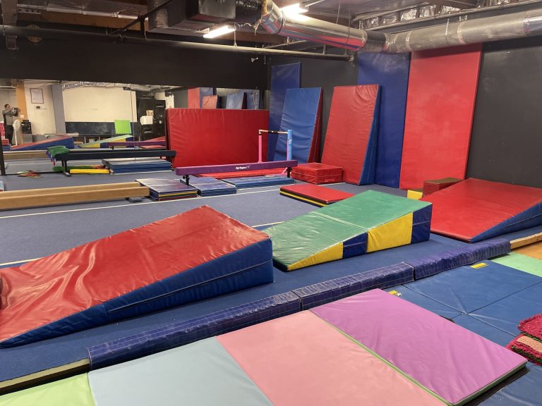 Gymnastics Facility with gymnastics equipment Colorful Mats Mini Gym Area