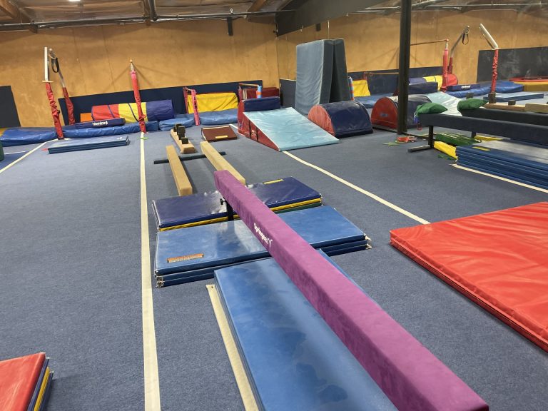 Gymnastics Facility with gymnastics equipment Colorful Mats Mini Gym Area