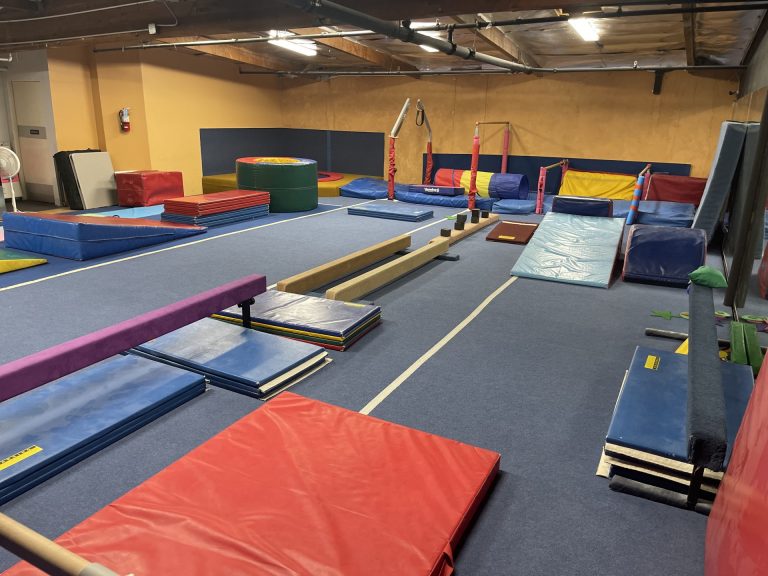 Gymnastics Facility with gymnastics equipment Colorful Mats Mini Gym Area