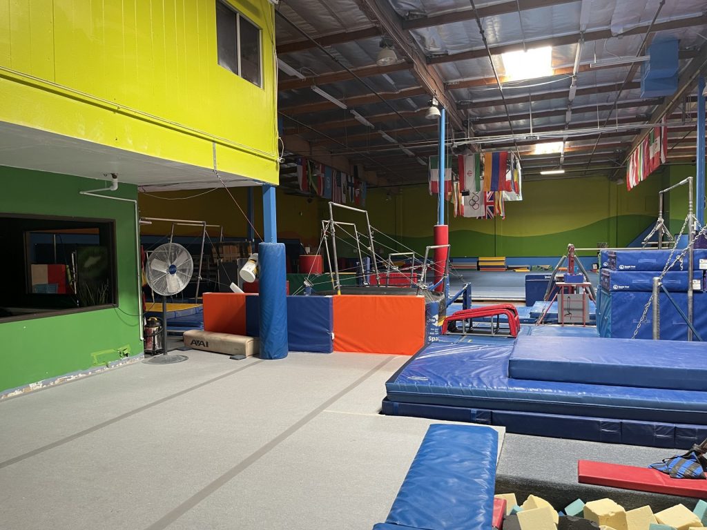 Gymnastics Facility with gymnastics equipment Colorful Mats