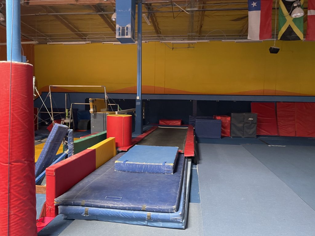 Gymnastics Facility with gymnastics equipment Colorful Mats - Tumble Track Area